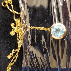 Exquisite 14K Gold Blue Topaze necklace. 18"